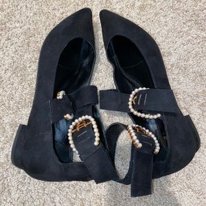 Black dress shoes with pearl accents